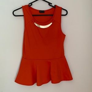 Orange top with gold necklace attached. Size:M